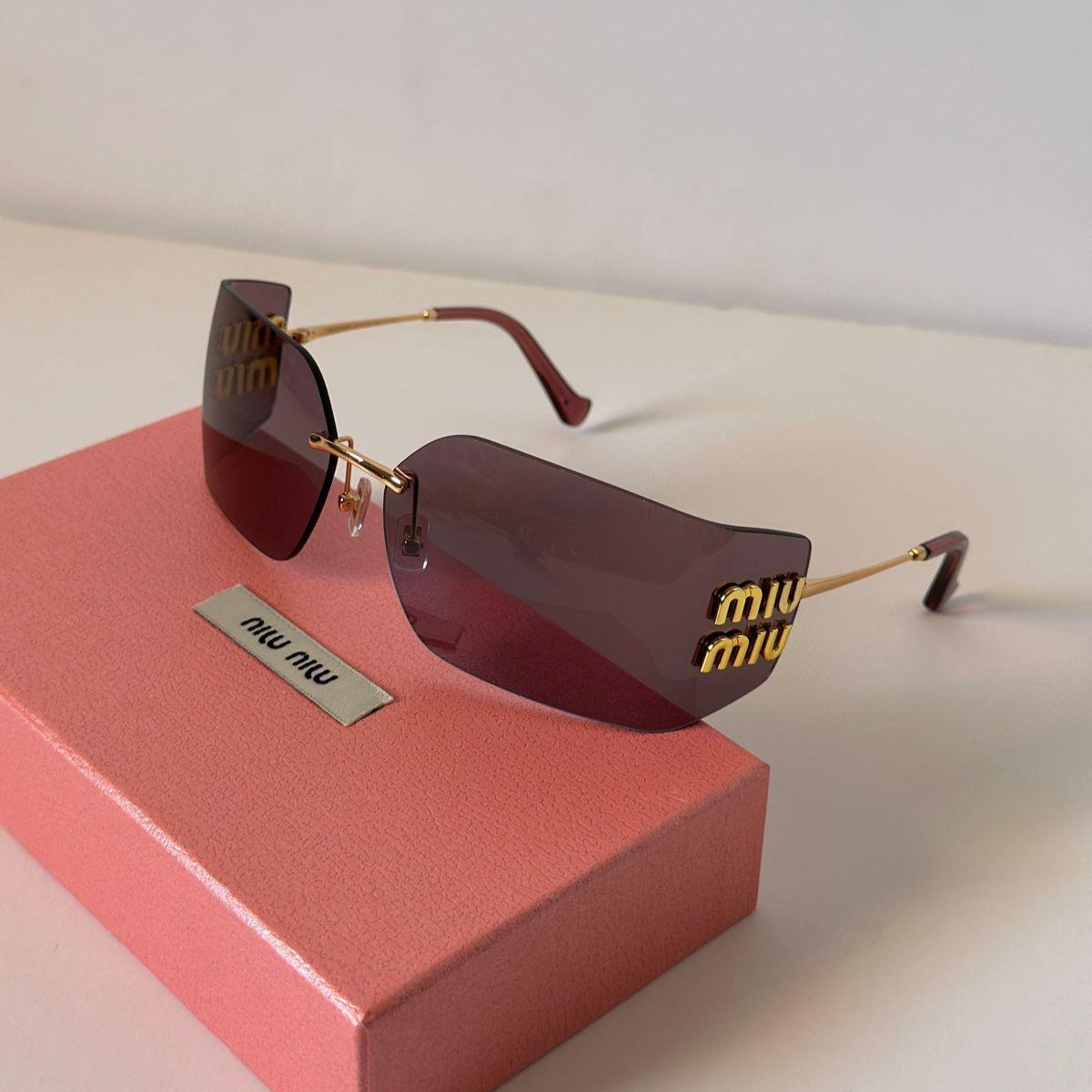 MiuMiu Luxe Sunglasses