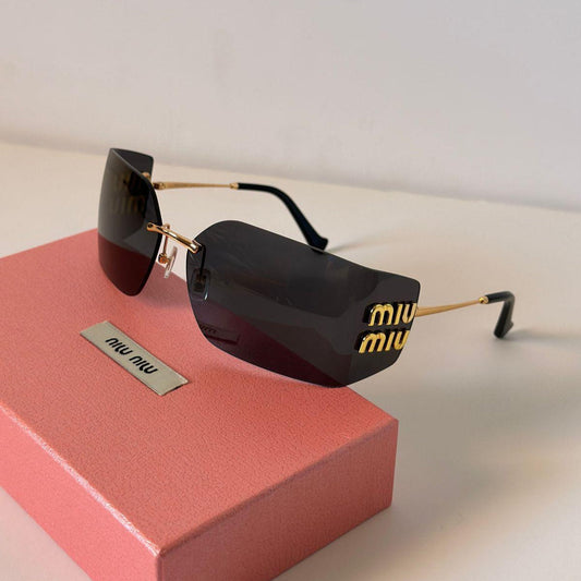 MiuMiu Luxe Sunglasses